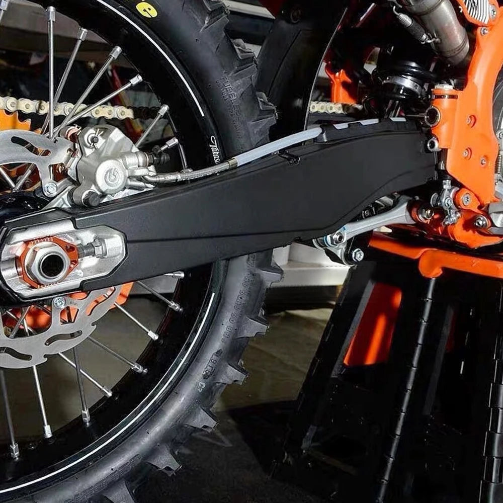 Protecteur de Bras Oscillant ABS KTM EXC (2 Coloris)